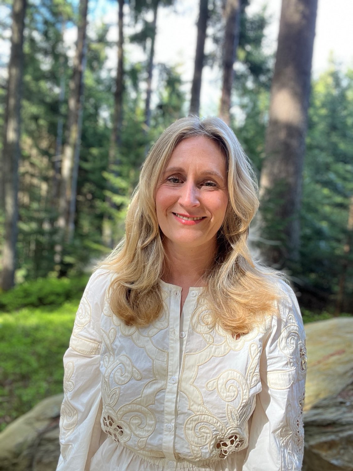 Portrait of Michaela Christine Wolf in a forest