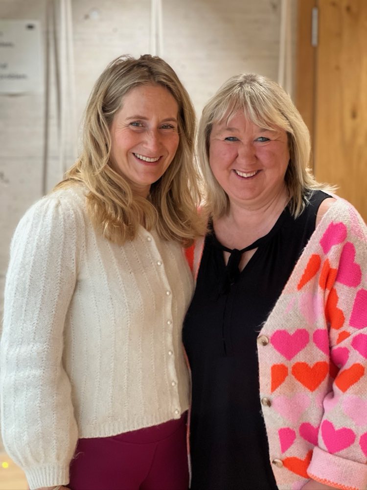 Two women sharing a warm moment